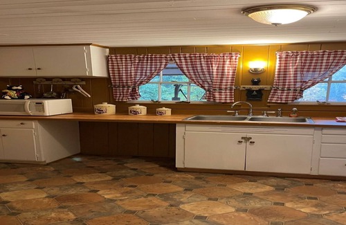 Chimney Rock Cabin | Lazy Lodge with Waterfall View. Perfect for family, deck, pool table, foosball.