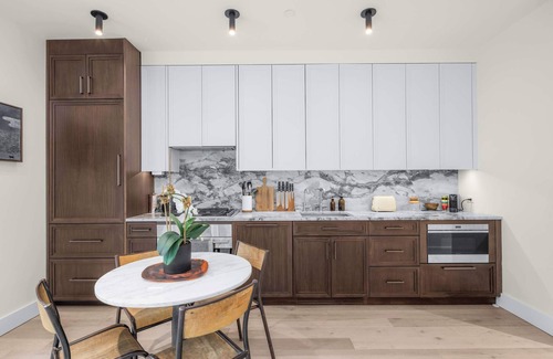 Bowery Apartment | Library Loft by StayHaus | 2BR Full-Service Condo with Terrace