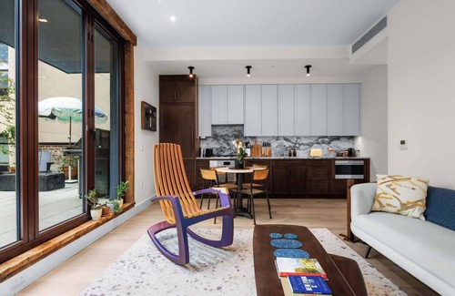 Bowery Apartment | Library Loft by StayHaus | 2BR Full-Service Condo with Terrace