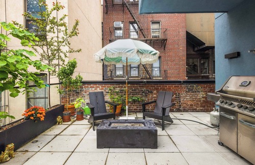 Bowery Apartment | Library Loft by StayHaus | 2BR Full-Service Condo with Terrace