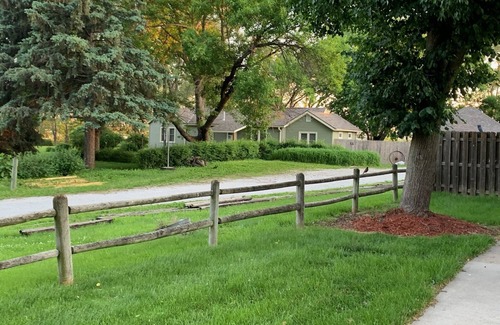 North Central Omaha Cottage | Lily's Cozy Cottage, a quiet corner to unwind, and 20 minutes to everything.