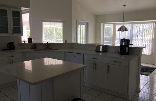 Pelican Villa | LOCATED ON GULF ACCESS CANAL WITH VIEWS!nBrand new pool enclosure!