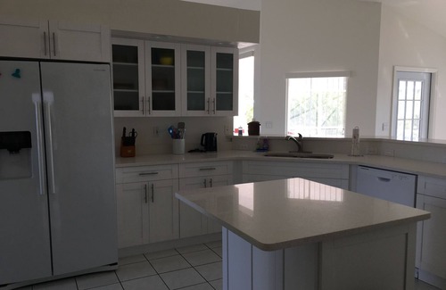 Pelican Villa | LOCATED ON GULF ACCESS CANAL WITH VIEWS!nBrand new pool enclosure!