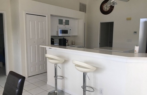 Pelican Villa | LOCATED ON GULF ACCESS CANAL WITH VIEWS!nBrand new pool enclosure!