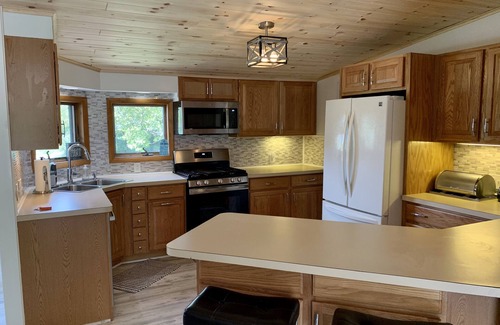 Boyne City House | Located on Porter creek across from Lake Charlevoix. 10 minutes to Boyne Mtn.
