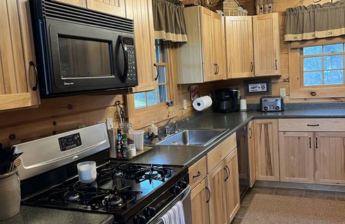 Colebrook Ski Chalet | Log Cabin on 6 acres w direct snowmobile trail access, Mountain views & sunsets
