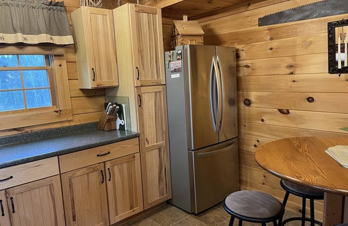 Colebrook Ski Chalet | Log Cabin on 6 acres w direct snowmobile trail access, Mountain views & sunsets