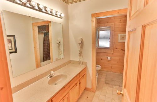 Gatlinburg House | Log Inn, 5 bed 3 bath group cabin in Gatlinburg with game room and hot tub, seasonal resort pool