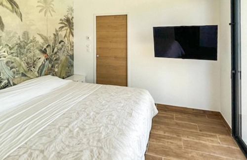 Roujan House | Look forward to an unforgettable vacation in this modern vacation home with pool.