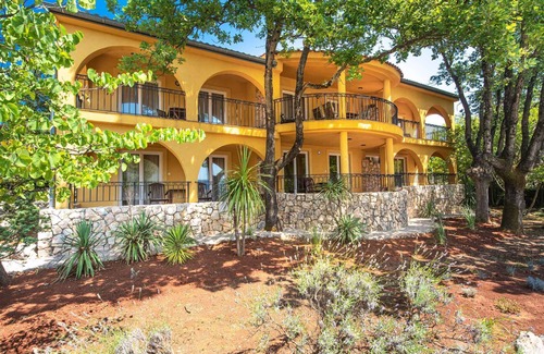 Brzac Apartment | Lotus Resort vacation apartment with swimming pools and garden as well as children's playground and parking lot surrounded by greenery and forest