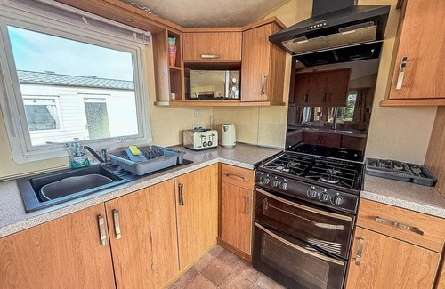 Louth House | Lovely 6 berth caravan with decking at Sunnydale Holiday Park ref 35130SD