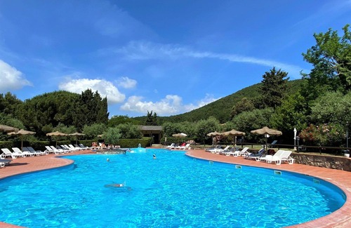 Riparbella Apartment | Lovely apartment for 4 guests with pool, A/C, WIFI, TV, patio and parking