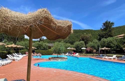 Riparbella Apartment | Lovely apartment for 4 guests with pool, A/C, WIFI, TV, patio and parking