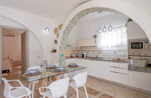 Eden Beach Villa | Lovely apartment in villa for 11 guests with A/C, pool, WIFI, TV, patio and pets allowed