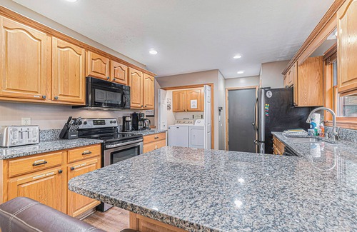 Thompsonville House | Lovely home near Crystal Mountain Resort with game room, private hot tub, sauna