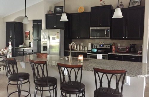 Palm Coast House | LOVELY & INVITING Home w/Heated Pool in Golf Community near Flagler Beach!