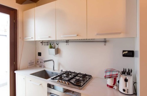 Affori Apartment | Lovely one-bedroom apartment with two balconies in the lively Dergano area.
