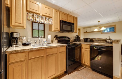 Boyne Falls Condo | Lower Disciples Unit | Walkable to Boyneland Chairlift | Sleeps 4 Guests!