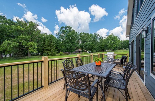 Waterfront Greens House | Lucky Bear Lakeside: Lake Front Home w/ Hot Tub & Community Amenities