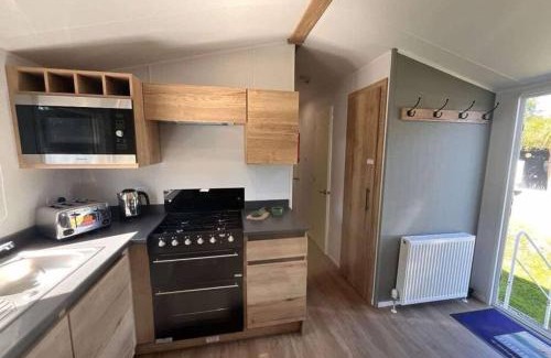Newquay House | Lucky Shamrock Caravan - Modern Newquay Hideaway near Beautiful Crantock Beach