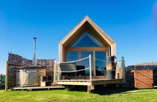 Brightlingsea House | Lushna 1 Mezzanine at Lee Wick Farm Cottages & Glamping