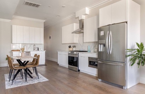McGinley Square Condo | LUX 3BR Oasis with Parking & Rooftop Minutes to NYC