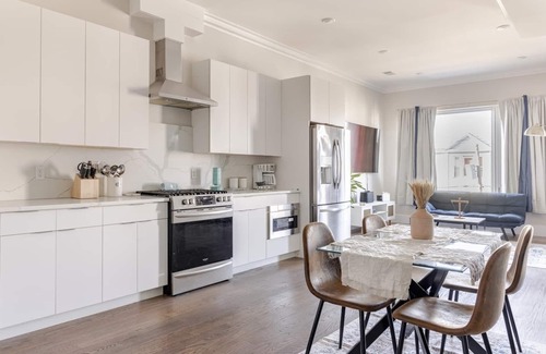 McGinley Square Condo | LUX 3BR Oasis with Parking & Rooftop Minutes to NYC