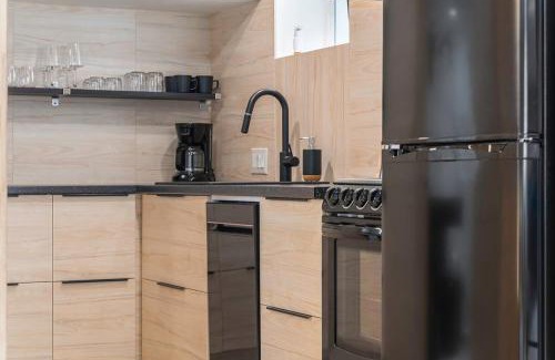 Aksarben - Elmwood Park Apartment | Lux Studio Oasis Hot Tub Cozy Heated Floors