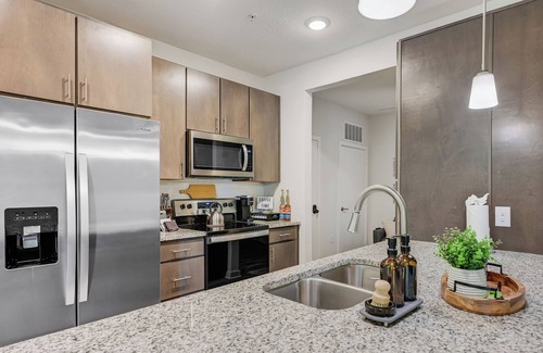 Deerwood Apartment | Luxe Poolside Condo, King Bed, Near Mayo Clinic, St Johns Town Center & Beaches