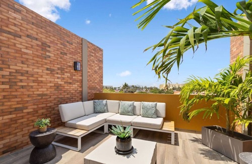 Tuscany Residence Aruba House | Luxe Townhouse Steps from Ritz & Palm Beach at Porta Al Sole 18 by Bocobay