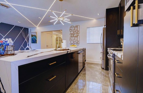 Ives Estates Villa | Luxe Tropical Paradise w Cinema, Kids Playground, Pool, BBQ, 9 Beds