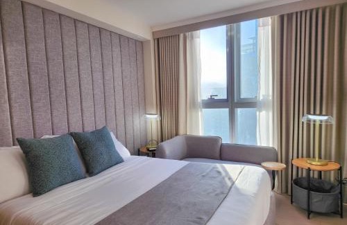 Bonifacio Global City Apartment | LUXESTAYSMNL STYLISH FAMILY 2BR SUITE POOLGYM 400MBPS WIFI NETFLX Amazing City View