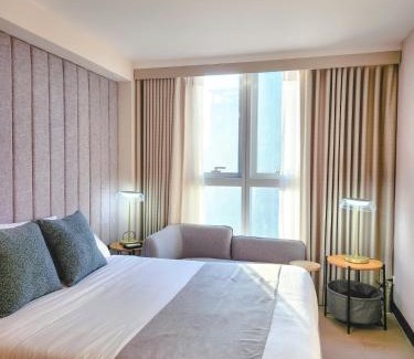 Bonifacio Global City Apartment | LUXESTAYSMNL STYLISH FAMILY 2BR SUITE POOLGYM 400MBPS WIFI NETFLX Amazing City View