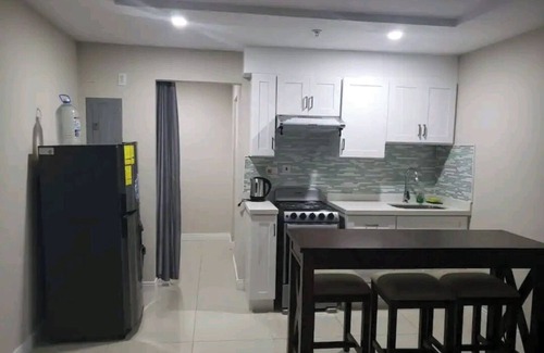 Portmore Apartment | Luxuriate poolside or on the private beach at this comfy studio apartment.
