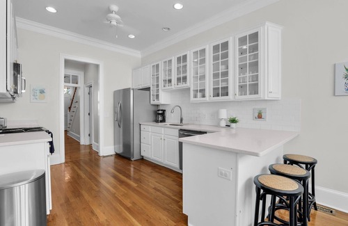 Hitch Village - Fred Wessels Homes House | Luxurious Home on Crawford Sq w/Rooftop Deck + Parking by Lucky Savannah