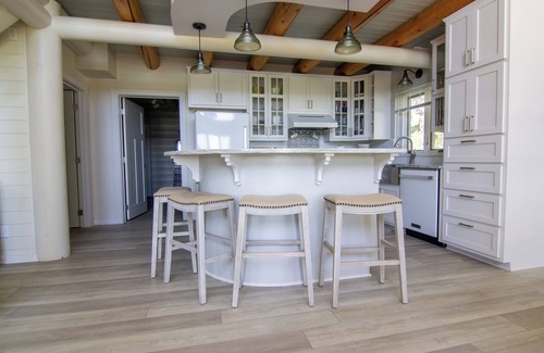 Moose Lake House | Luxurious Lakefront Log Home with Entertainment Building on Moosehead Laken