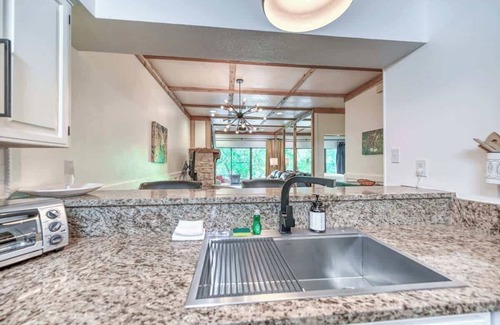 New Braunfels Condo | Luxurious Riverfront Condo Just 1 Blk to Schlitterbahn!