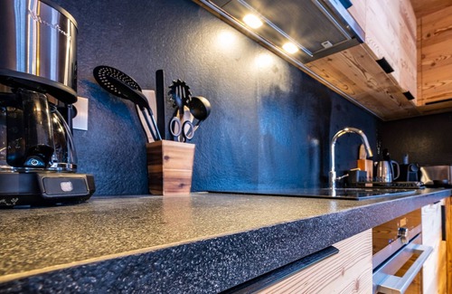 Les Allues Apartment | Luxury Apartment in Méribel-Mottaret: 85m², 6 Guests, Balcony, Garden, Garage, Hotel Services