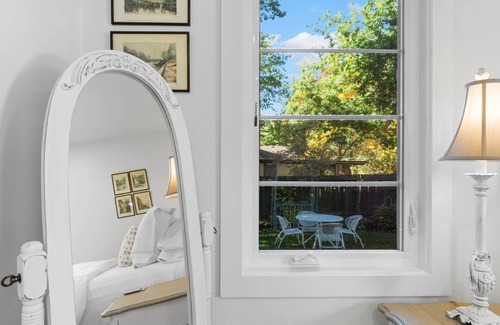 Collister House | Luxury at its Finest | Indulge in Gourmet Kitchen, Spacious Dining Area, Lovely Patio & Plush Beds