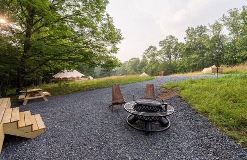 Great Cacapon RV Rental | Luxury Camping with King Bed - Clover Tent