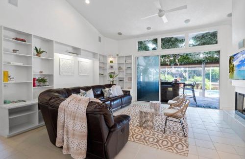 Palm Harbor House | Luxury Canal-Front Home with Heated Pool Spa Bicycles
