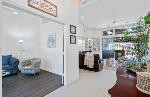 Palm Harbor House | Luxury Canal-Front Home with Heated Pool Spa Bicycles