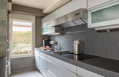 Mariakerke Apartment | Luxury design apartment, near the sea +private garden, parking, bicycle storage