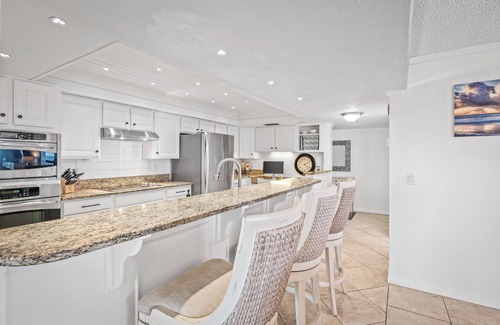 Ormond-by-the-Sea Condo | Luxury direct oceanfront corner penthouse with heated pool and garage parking