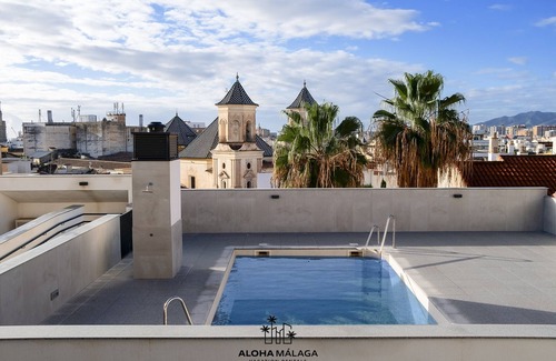 El Molinillo Apartment | Luxury Duplex With Pool and Padel Court in Town by Alohamalaga