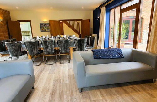 Woolland Cottage | Luxury barn conversion sleeping 16 with hot tub and ensuite bedrooms