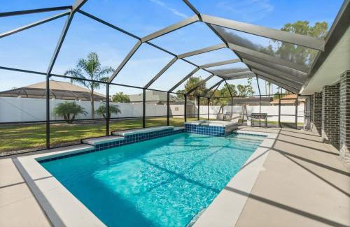 Palm Harbor House | Luxury Heated Pool & Spa Fenced Yard & Beach Gear