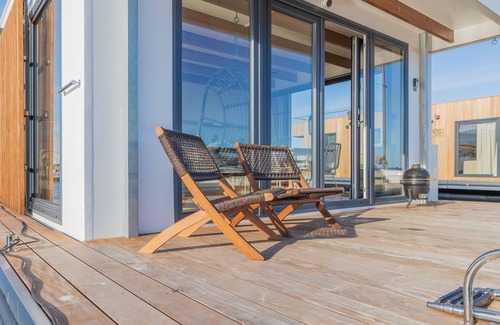 Monnickendam Boat Rental | Luxury Houseboat: "Liberdade" with sauna. Dinghy included.