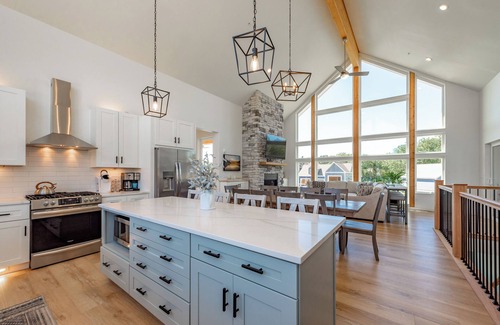 Waterfront Greens House | Luxury Lake Escape w/Lake Access & Indoor Pool