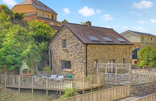 Tan-y-groes Ski Chalet | Luxury lodge with two doubles, one with en suite shower and one twin.